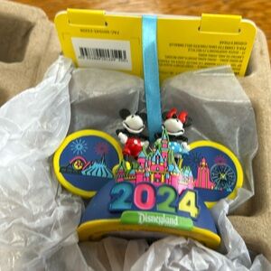 Disney 2024 lighted Christmas Ornament Still in box. Excellent condition.